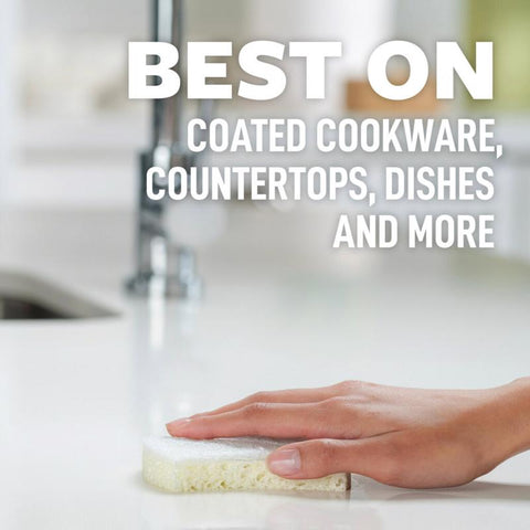 Using Scotch-Brite Greener Clean Non-Scratch Scrub Sponge on countertop