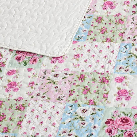 Closeup of patterns of Virah Bella Savannah Quilt Set
