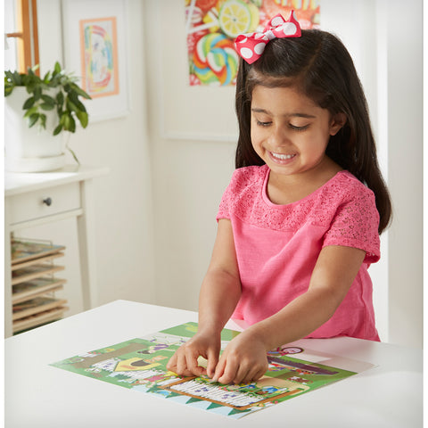 girl with sticker pad