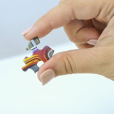 Hand holding puzzle piece