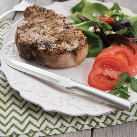 Utility/Steak Knife DR104 displayed on plate and with steak